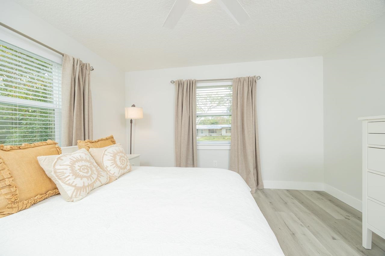 110 Queen Road St. Augustine, FL 32086 - Photo 31 of 37 a bedroom with a bed and a window