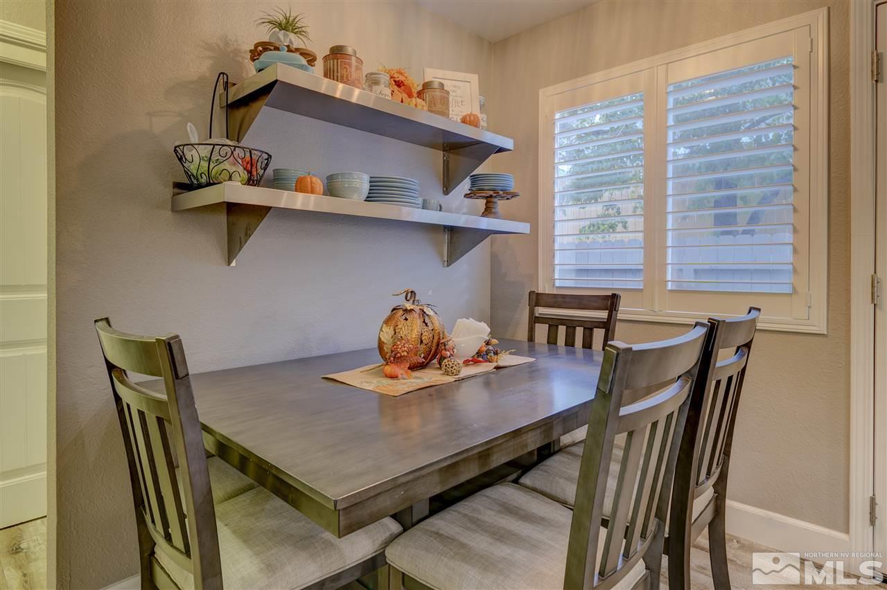 1408 East 9th Street Reno, NV 89512 - Photo 5 of 25 a view of a dining room with a table and chairs