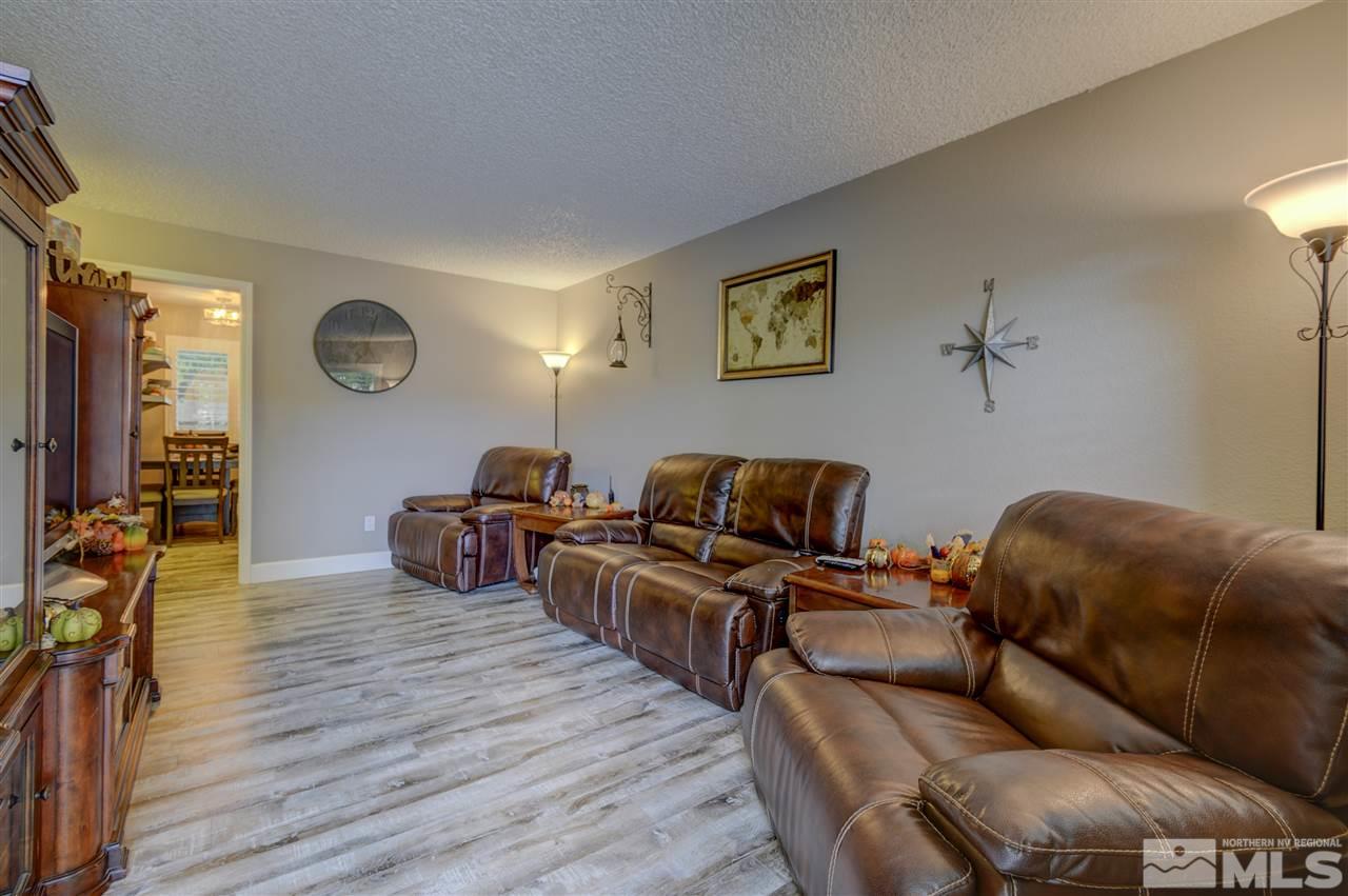 1408 East 9th Street Reno, NV 89512 - Photo 6 of 25 a living room with furniture and a wooden floor