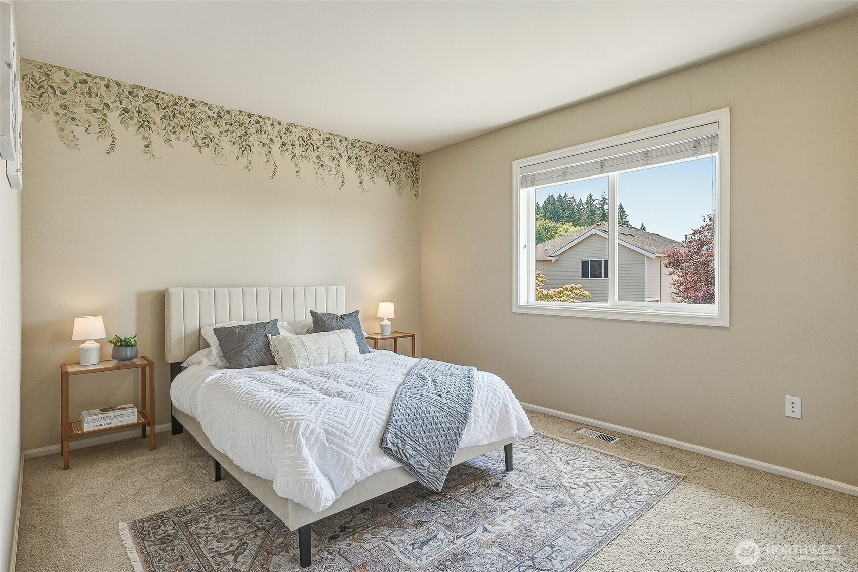 3932 221st Place Southeast Bothell, WA 98021 - Photo 26 of 36 a bedroom with a bed and a painting on the wall