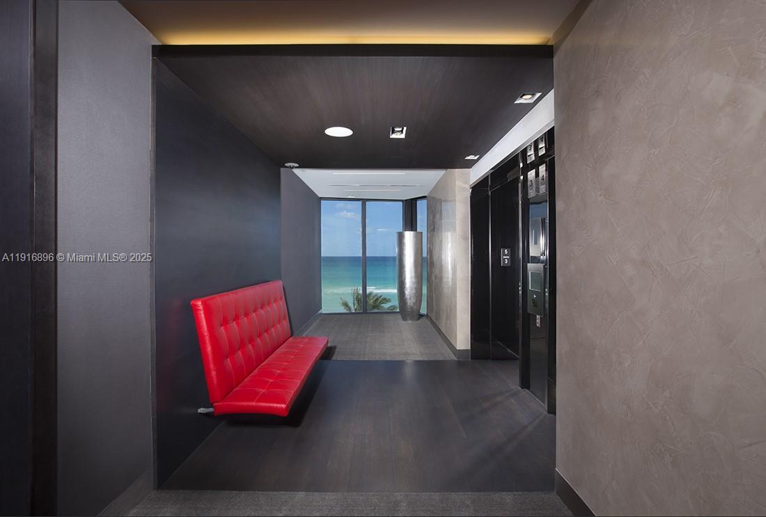 18555 Collins Avenue, Unit 3505 Sunny Isles Beach, FL 33160 - Photo 42 of 52 a view of a hallway with entryway