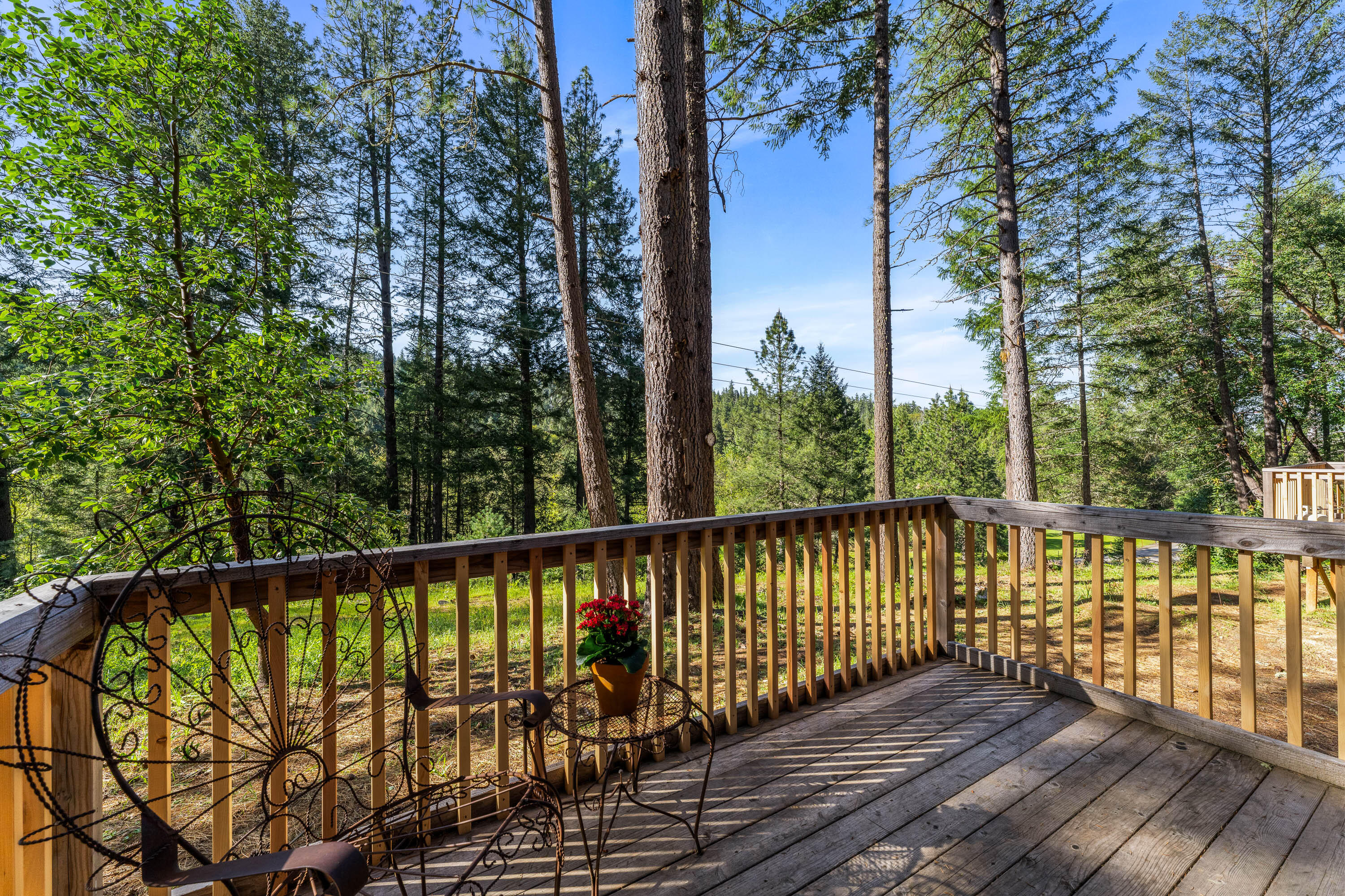 1201 Reeves Creek Road Selma, OR 97538 - Photo 21 of 38 a view of balcony with wooden floor