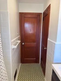 a bathroom with a sink and a shower