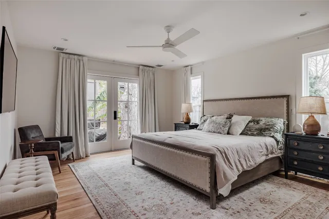 a bedroom with a bed and a couch