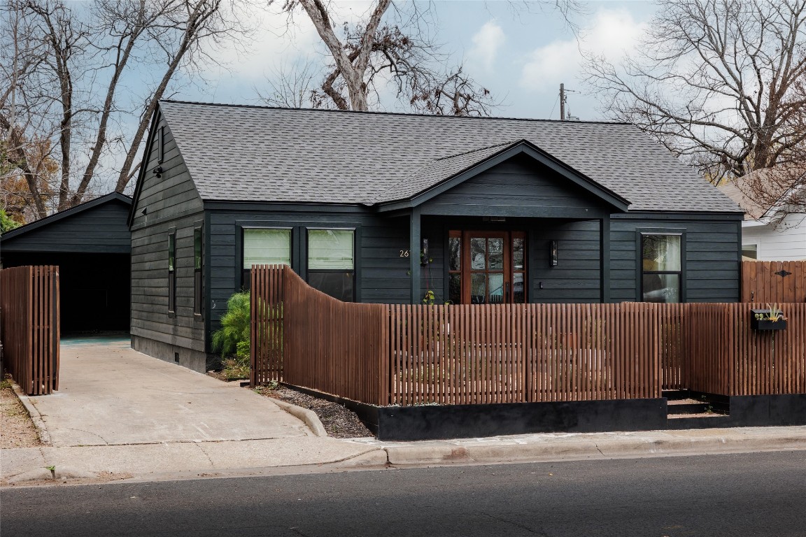 2613 East 2nd Street Austin, TX 78702 - Photo 2 of 30 front view of a house with a garage