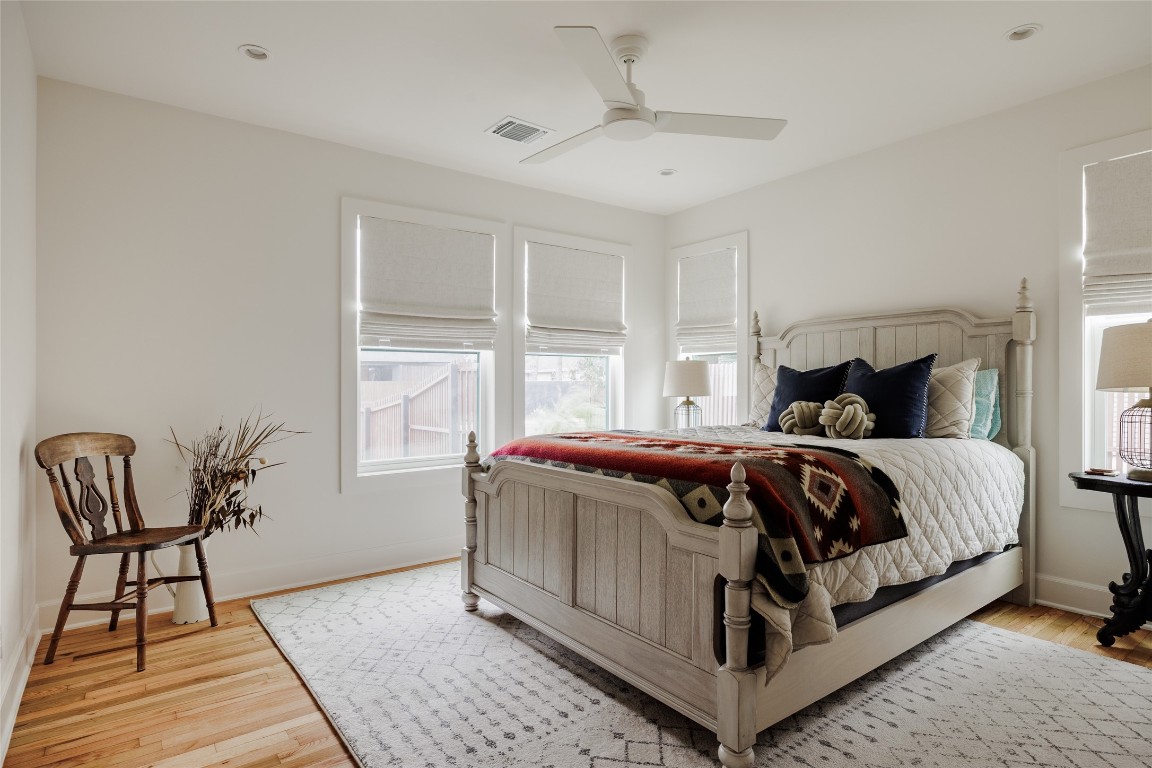 2613 East 2nd Street Austin, TX 78702 - Photo 23 of 30 a bedroom with a bed and window