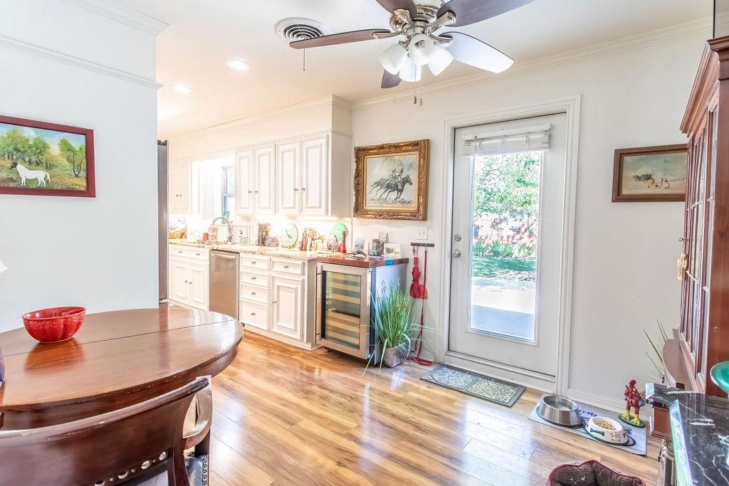 149 Russ Street Albany, TX 76430 - Photo 11 of 25 a view of a dining room with a table and chairs
