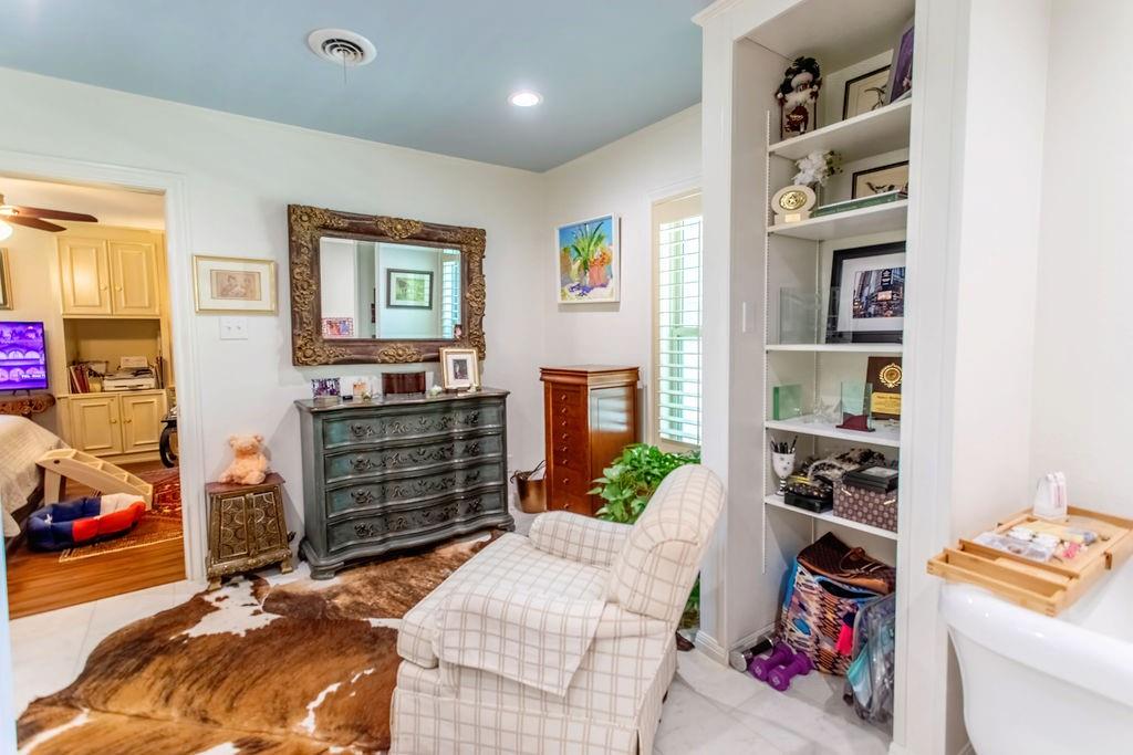 149 Russ Street Albany, TX 76430 - Photo 21 of 25 a bed room with a bed and a closet