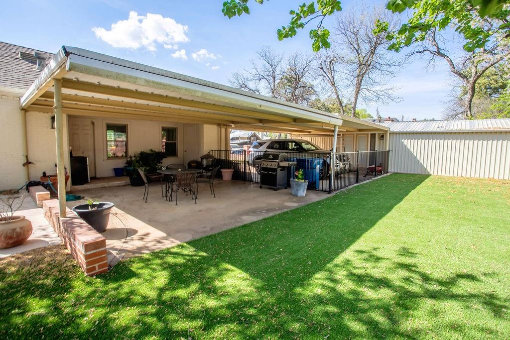 149 Russ Street Albany, TX 76430 - Photo 24 of 25 a view of a house with backyard porch and sitting area