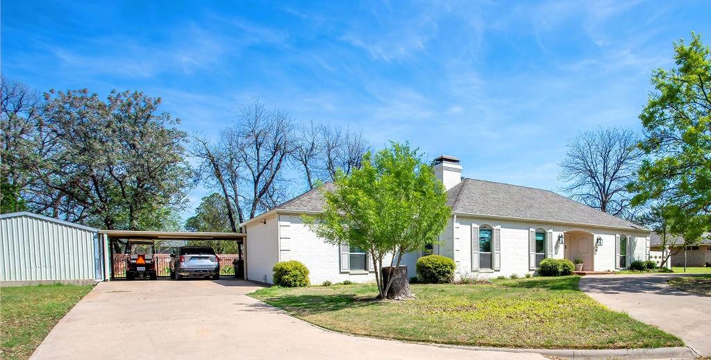 149 Russ Street Albany, TX 76430 - Photo 3 of 25 front view of a house with a yard