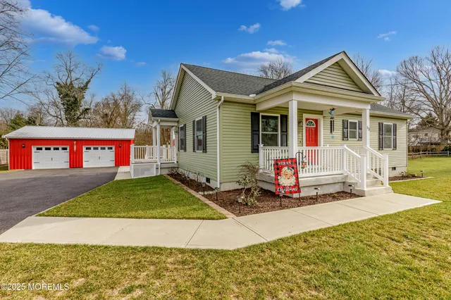 a front view of a house with a garage