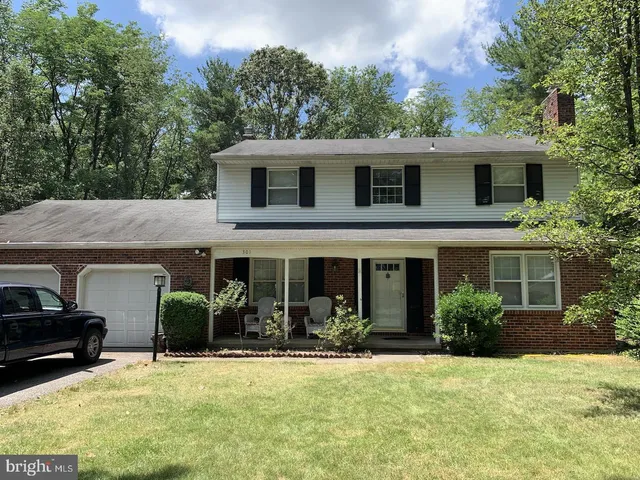 a front view of house with yard
