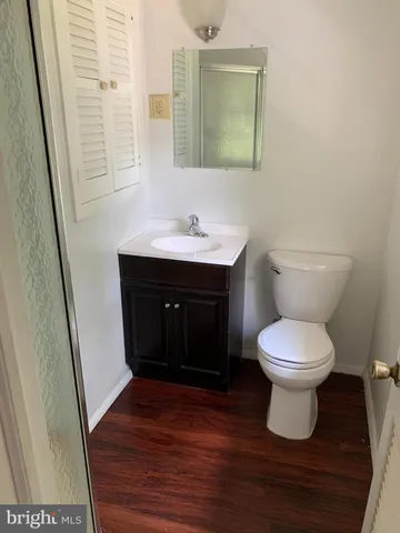 a bathroom with a toilet and a sink