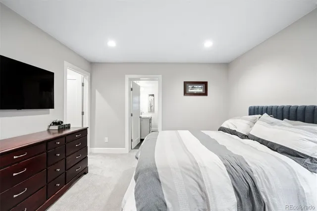 a bathroom with a sink double vanity and a mirror