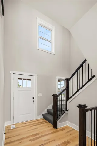a view of entryway with wooden floor