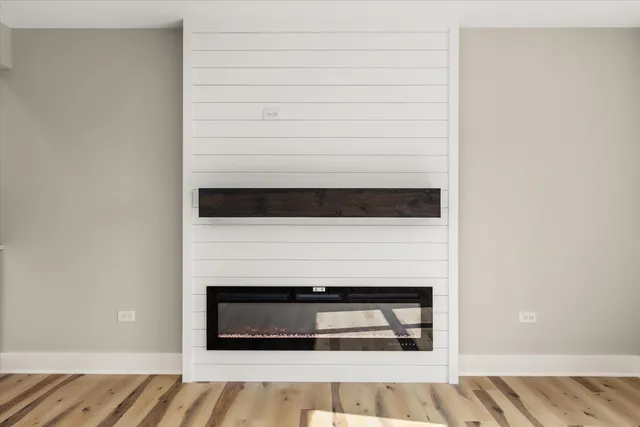 a living room with a fireplace