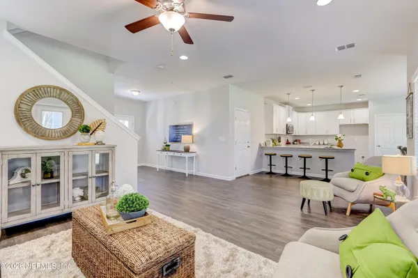 a living room with furniture and a table