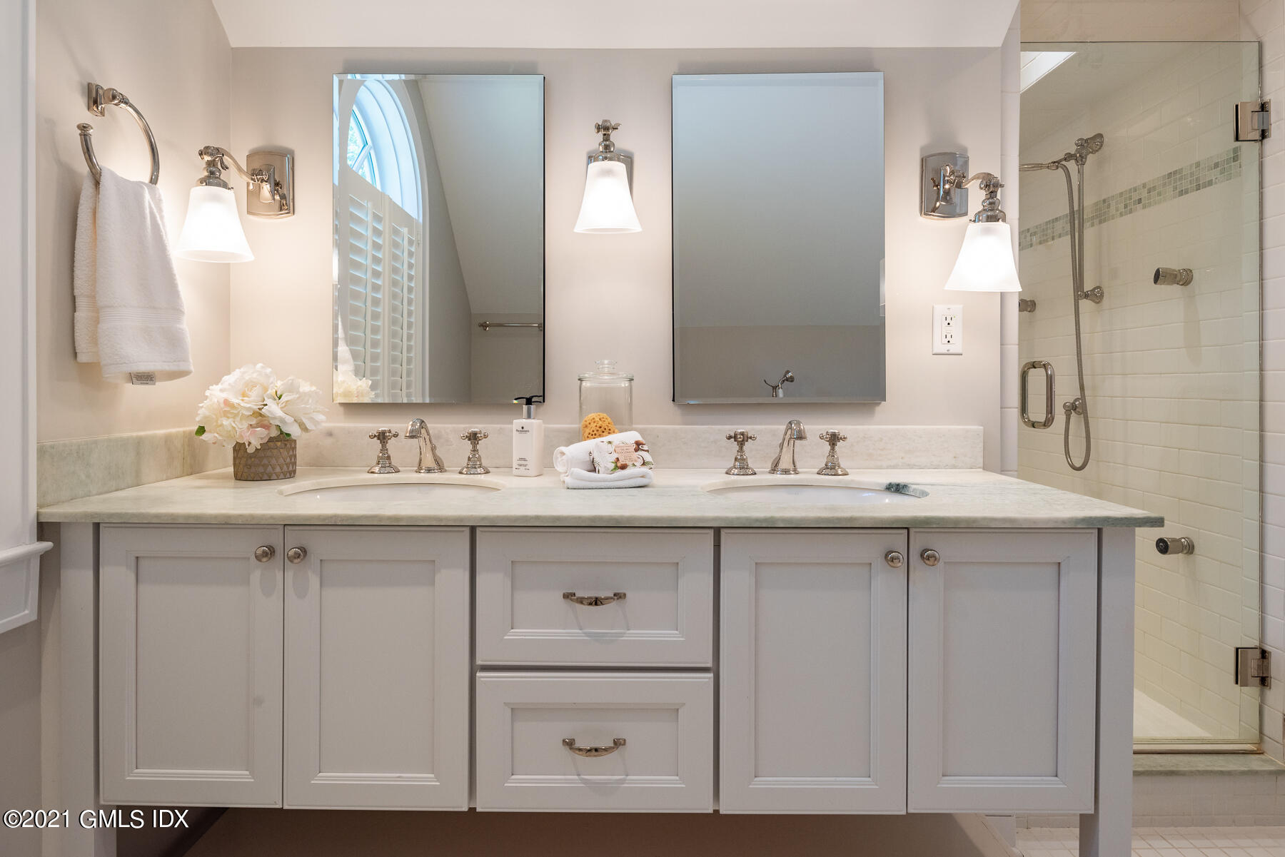 14 Meadow Road Riverside, CT 06878 - Photo 13 of 18 a bathroom with a sink and a mirror