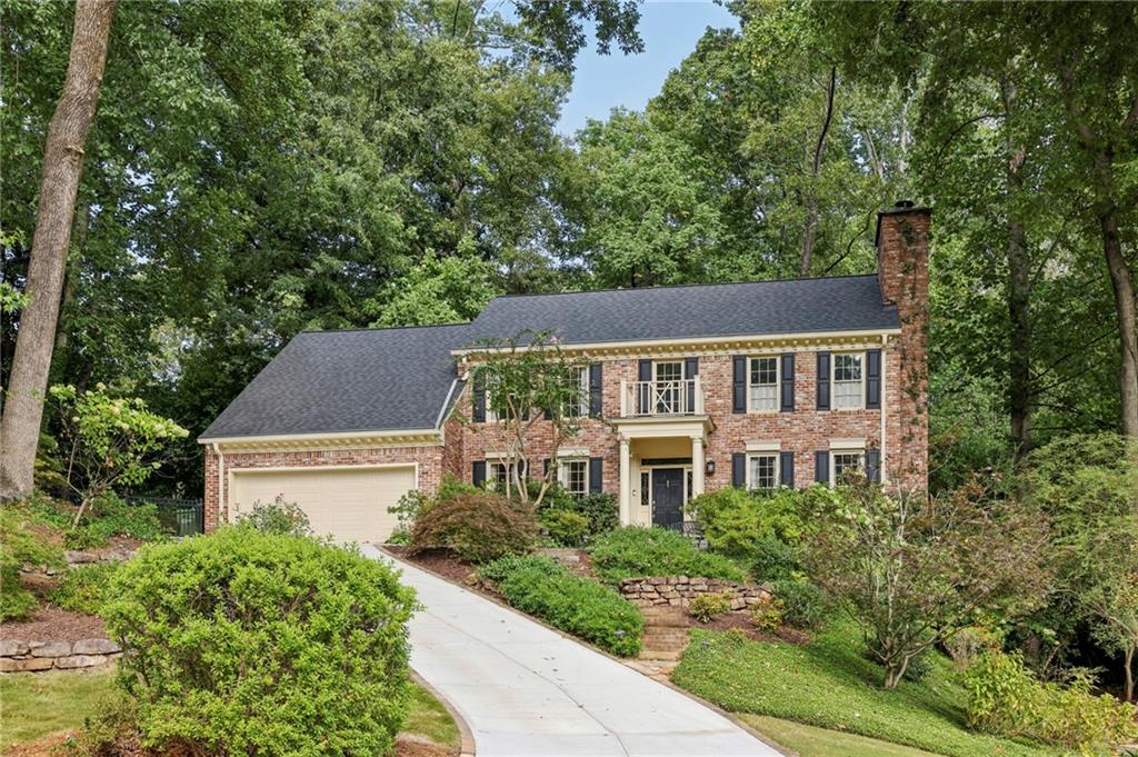 3612 Mayfair Road Northeast Atlanta, GA 30305 - Photo 1 of 1 a aerial view of a house with a yard and plants