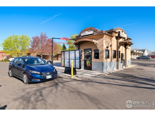 a car parked in front of a house