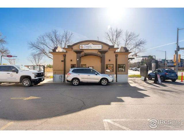 a view of a cars park in front of house