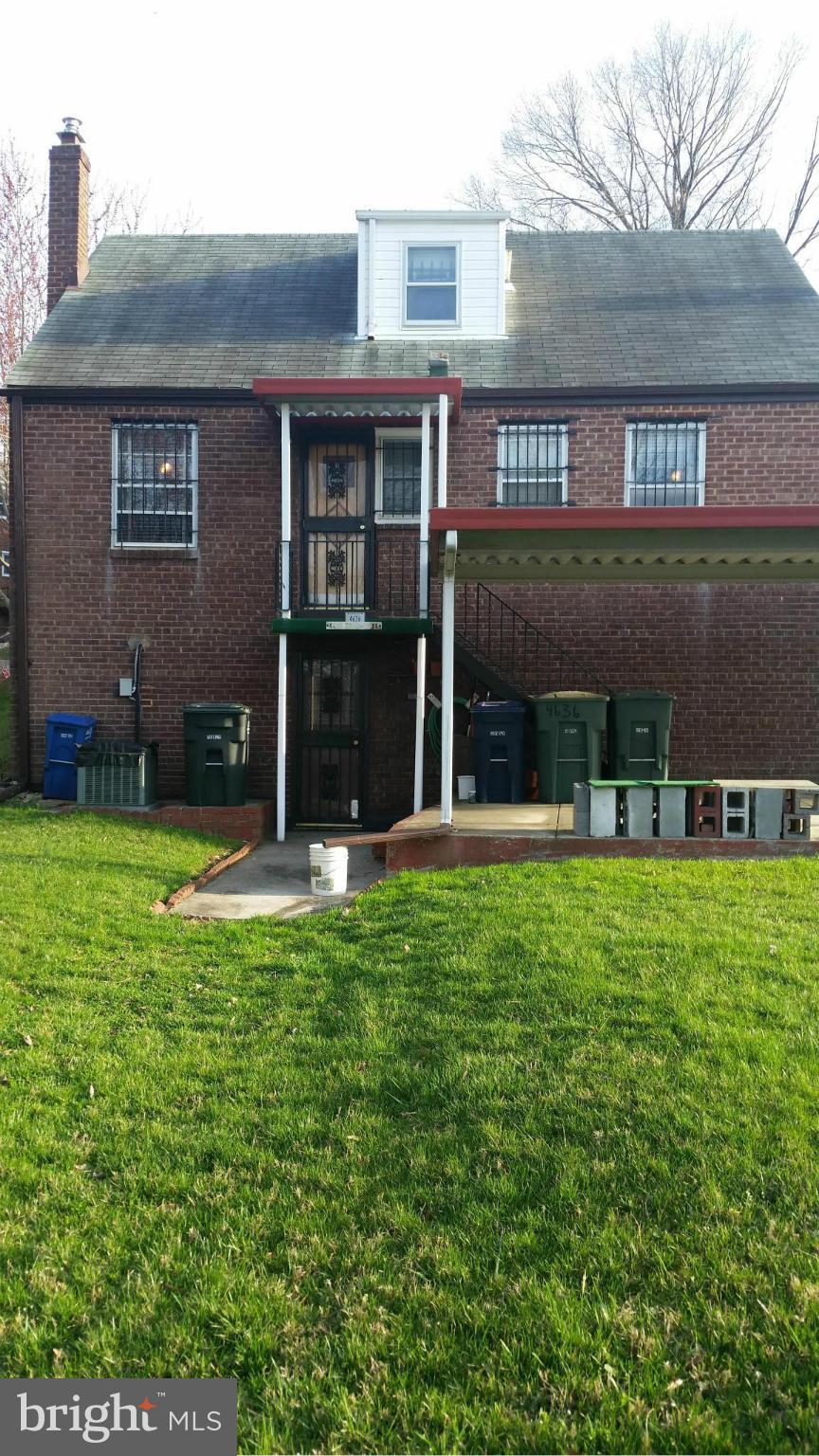 4636 Easy Place Southeast Washington, DC 20019 - Photo 2 of 29 front view of a house with a yard