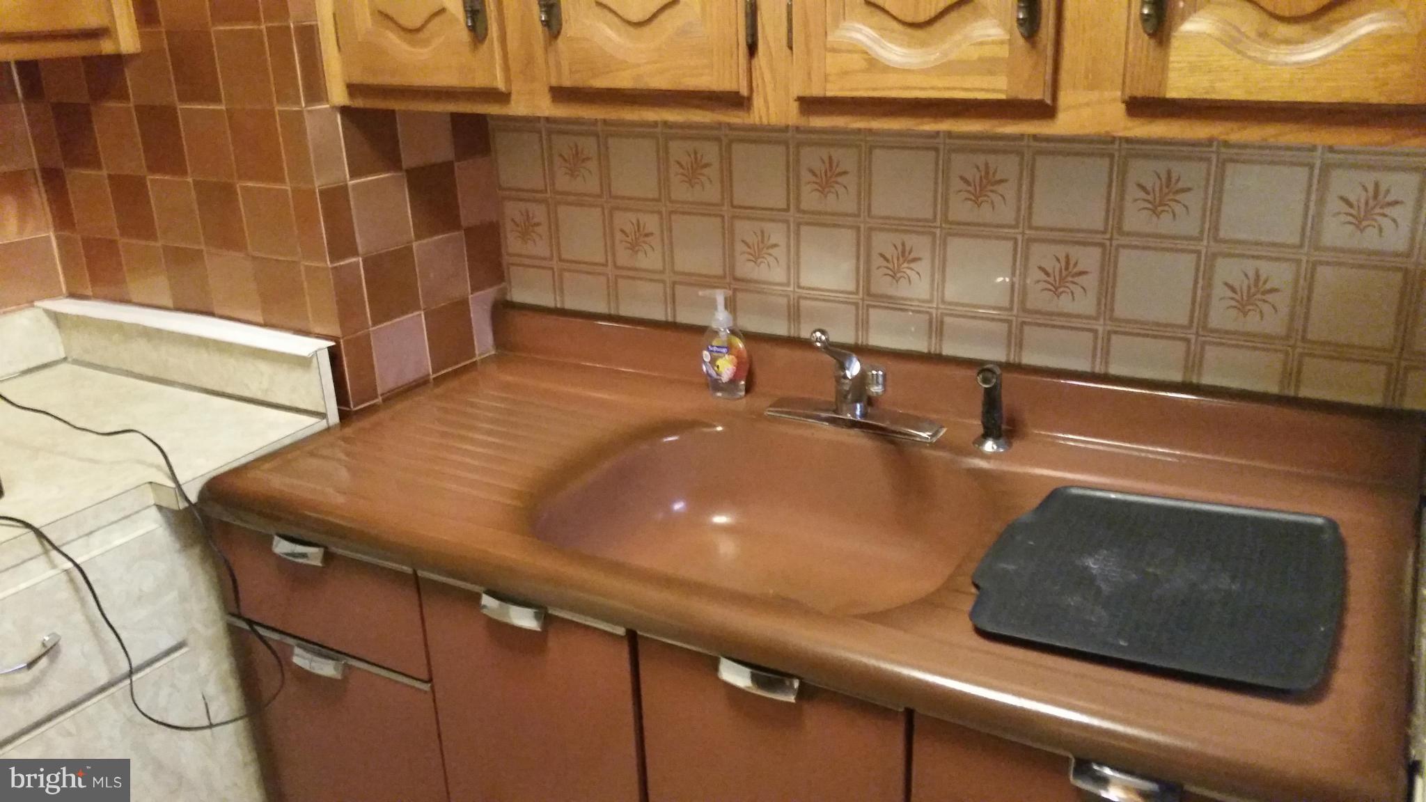 4636 Easy Place Southeast Washington, DC 20019 - Photo 11 of 29 a close view of tap
