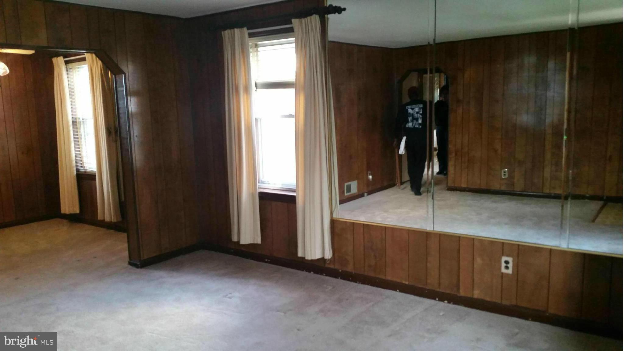 4636 Easy Place Southeast Washington, DC 20019 - Photo 7 of 29 an empty room with closet and windows