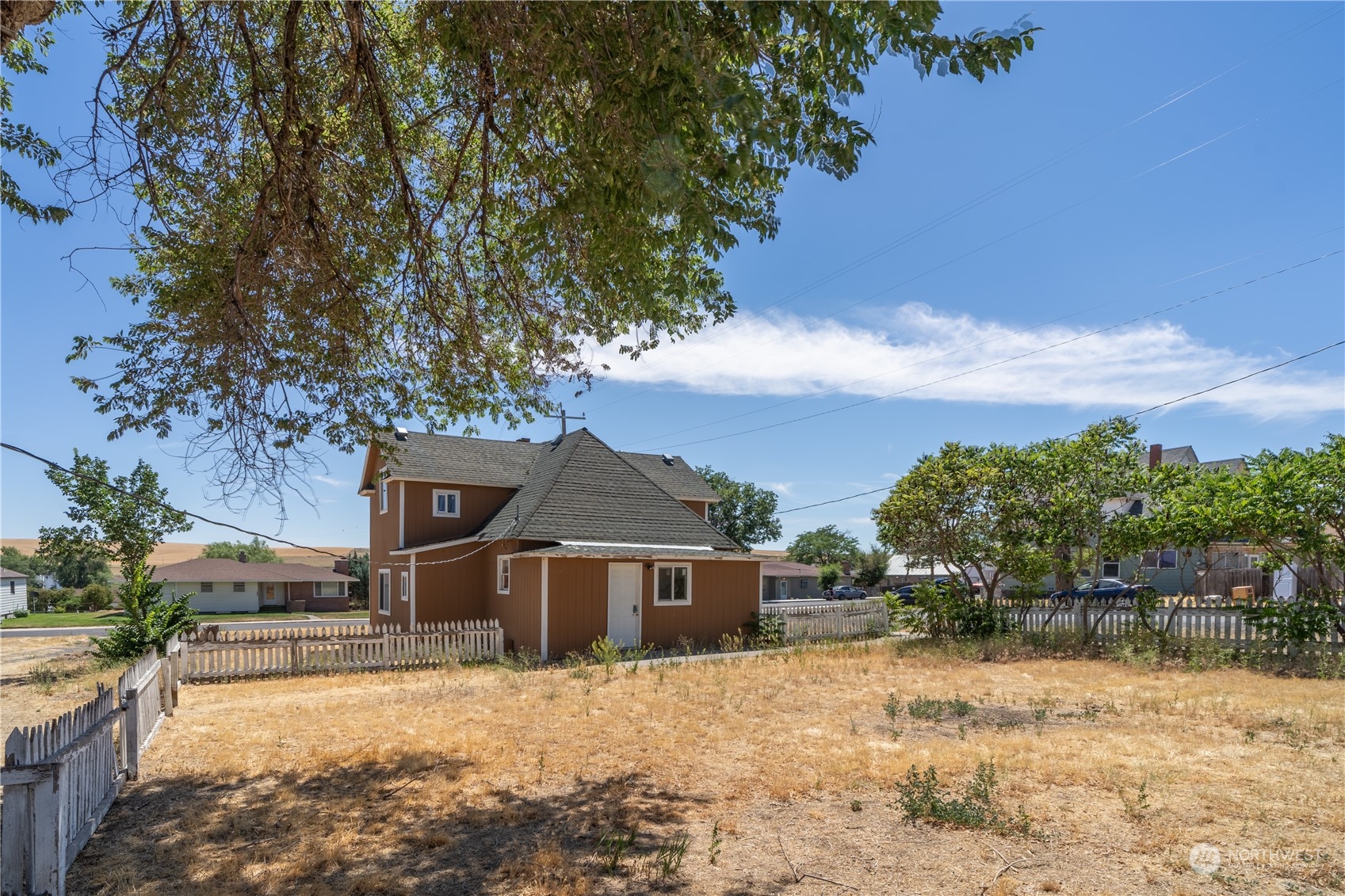 506 North I Street Lind, WA 99341 - Photo 13 of 40 a front view of a house with a yard covered in snow