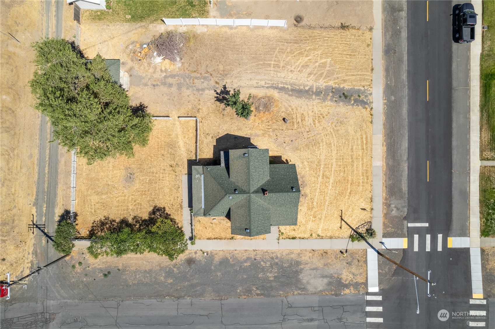 506 North I Street Lind, WA 99341 - Photo 16 of 40 a view of a balcony with floor to ceiling windows and wooden fence