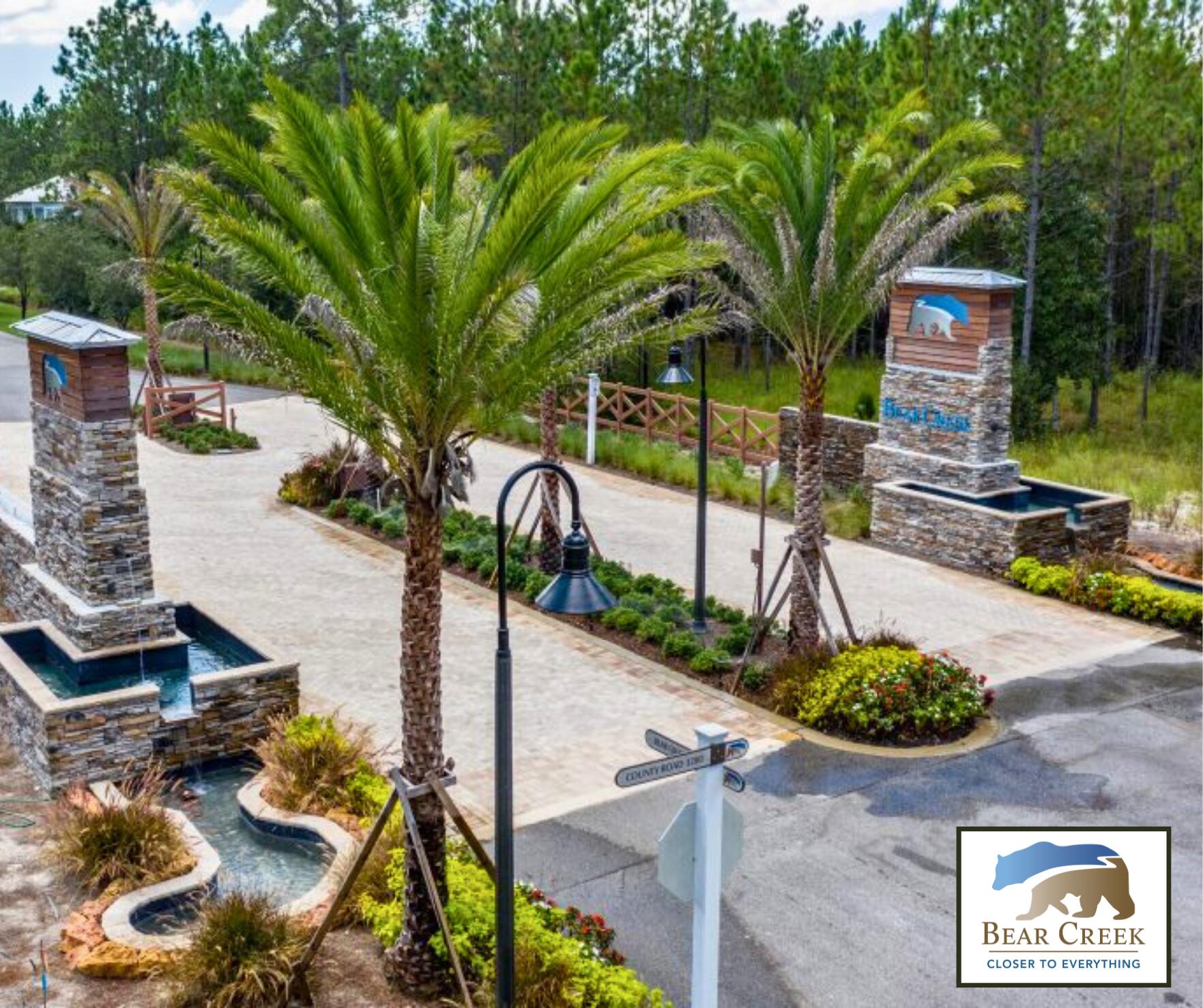 123 Sun Bear Circle Freeport, FL 32439 - Photo 11 of 14 a front view of a house with garden