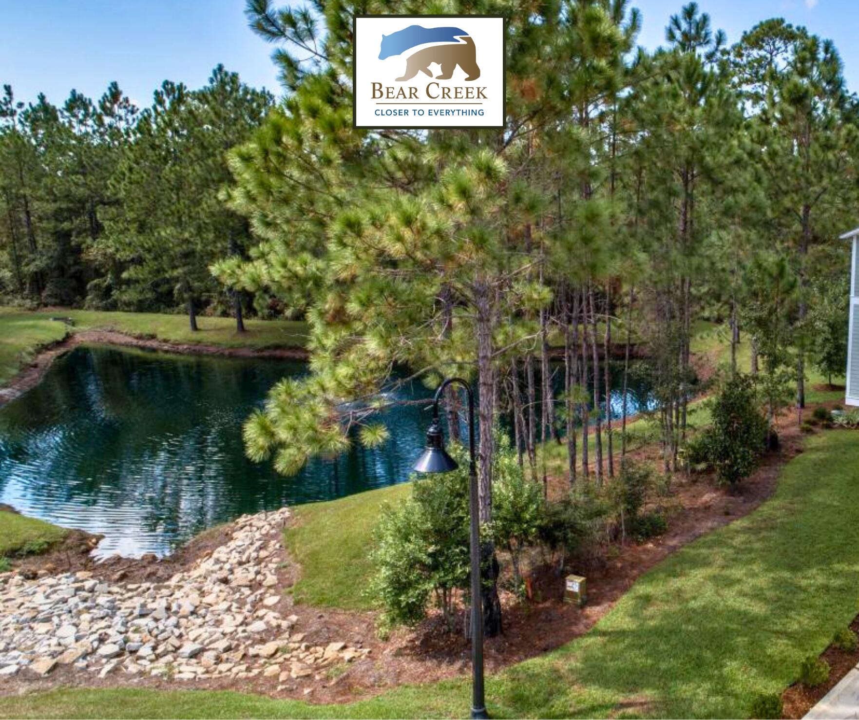 123 Sun Bear Circle Freeport, FL 32439 - Photo 12 of 14 a sign that is sitting on a brick wall