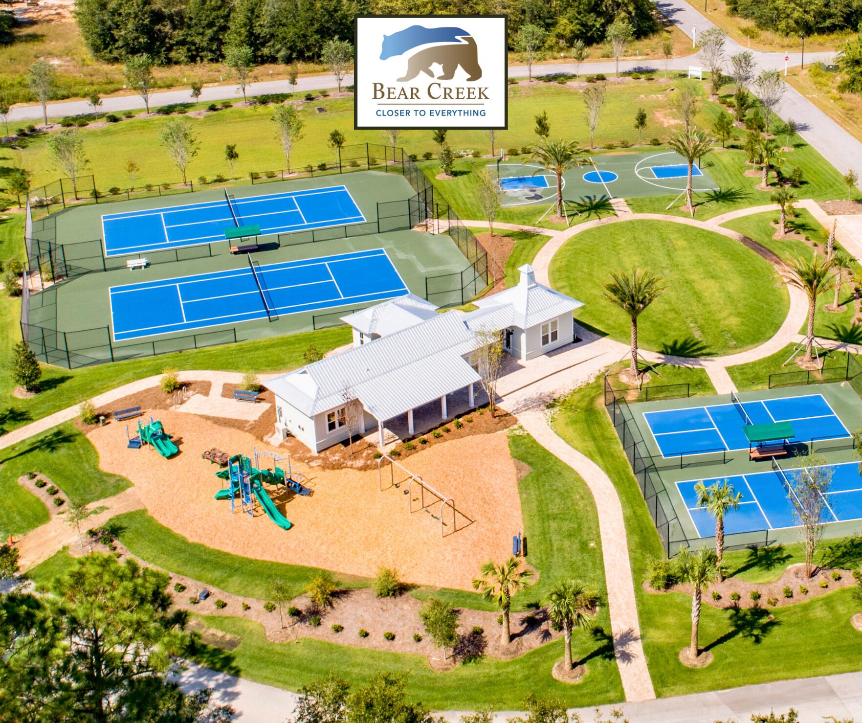 123 Sun Bear Circle Freeport, FL 32439 - Photo 5 of 14 a view of a swimming pool with a lawn chairs