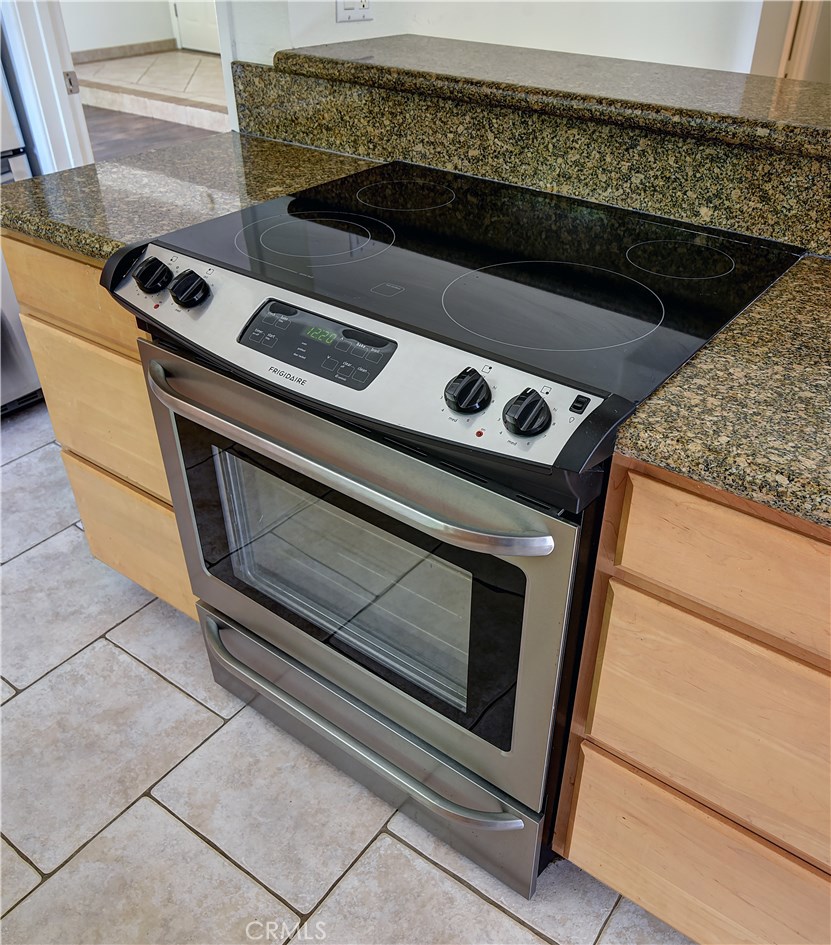 33381 Ocean Hill Drive Dana Point, CA 92629 - Photo 14 of 45 a stove top oven sitting inside of a kitchen