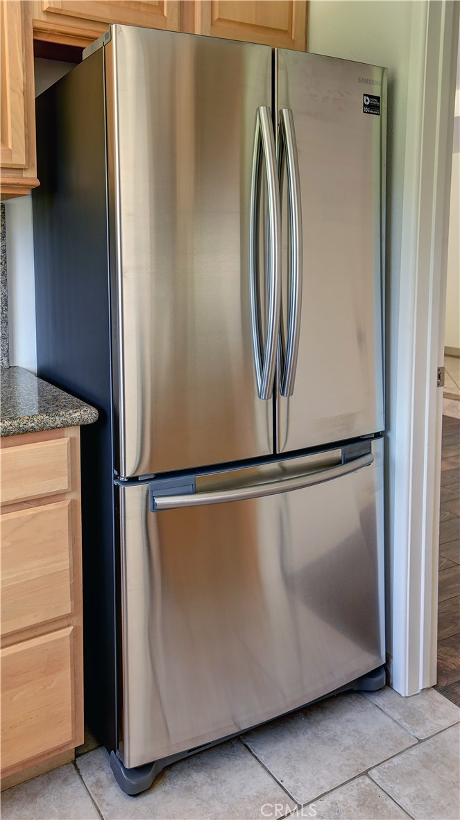 33381 Ocean Hill Drive Dana Point, CA 92629 - Photo 18 of 45 a close view of a refrigerator in kitchen