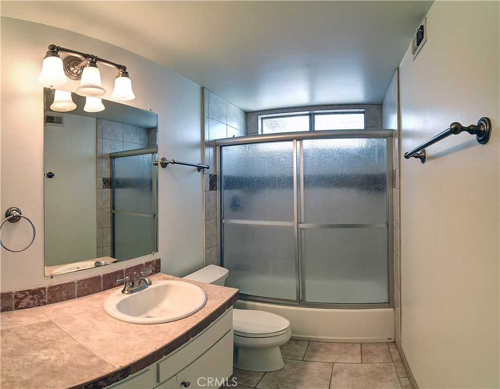 33381 Ocean Hill Drive Dana Point, CA 92629 - Photo 27 of 45 a bathroom with a sink a toilet and shower