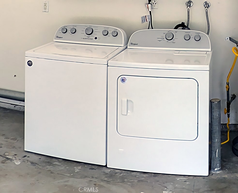 33381 Ocean Hill Drive Dana Point, CA 92629 - Photo 34 of 45 a utility room with dryer and washer