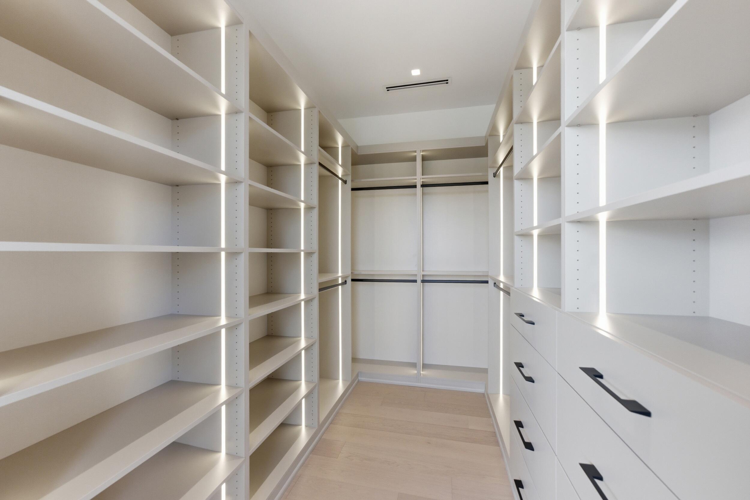 2360 Northeast 49th Street Lighthouse Point, FL 33064 - Photo 46 of 66 a view of walk in closet with empty racks