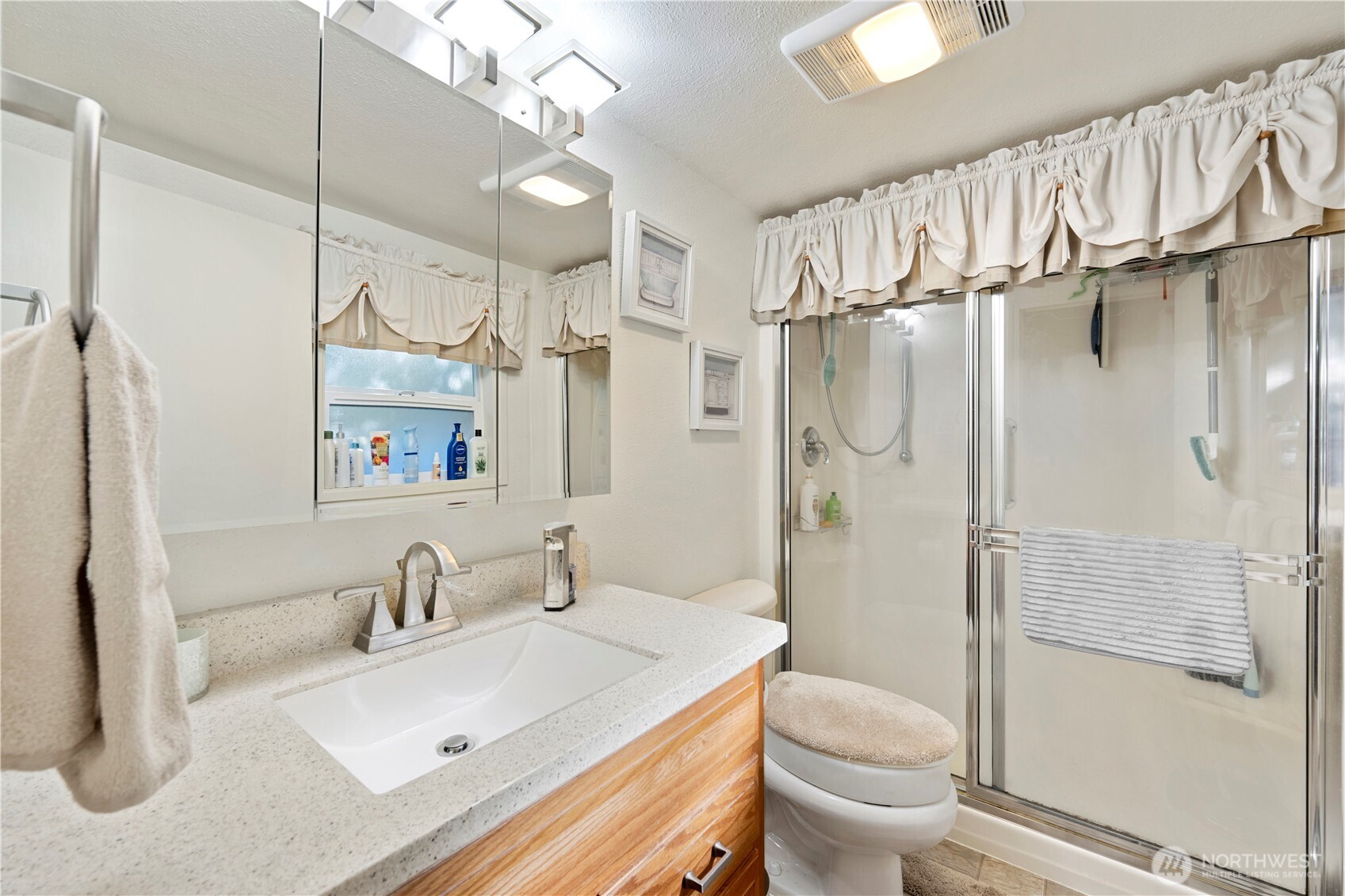 915 128th Street Southwest Everett, WA 98204 - Photo 17 of 25 a bathroom with a sink toilet and shower