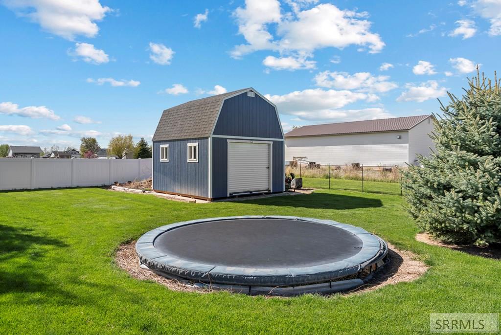 3987 East 170 North Rigby, ID 83442 - Photo 48 of 66 Shed and In Ground Trampoline