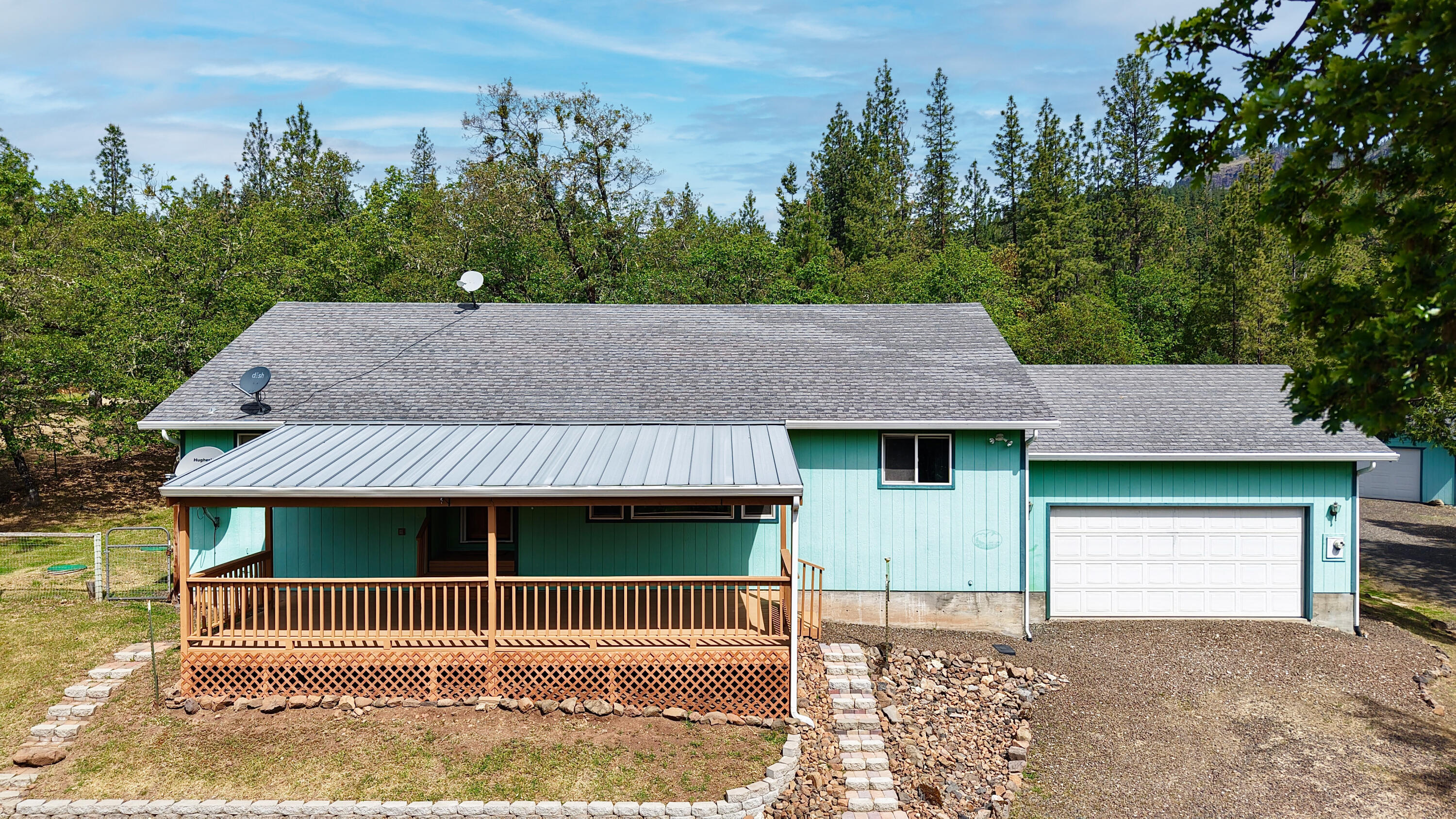 204 Shipley Terrace Prospect, OR 97536 - Photo 3 of 61 a front view of a house with garden
