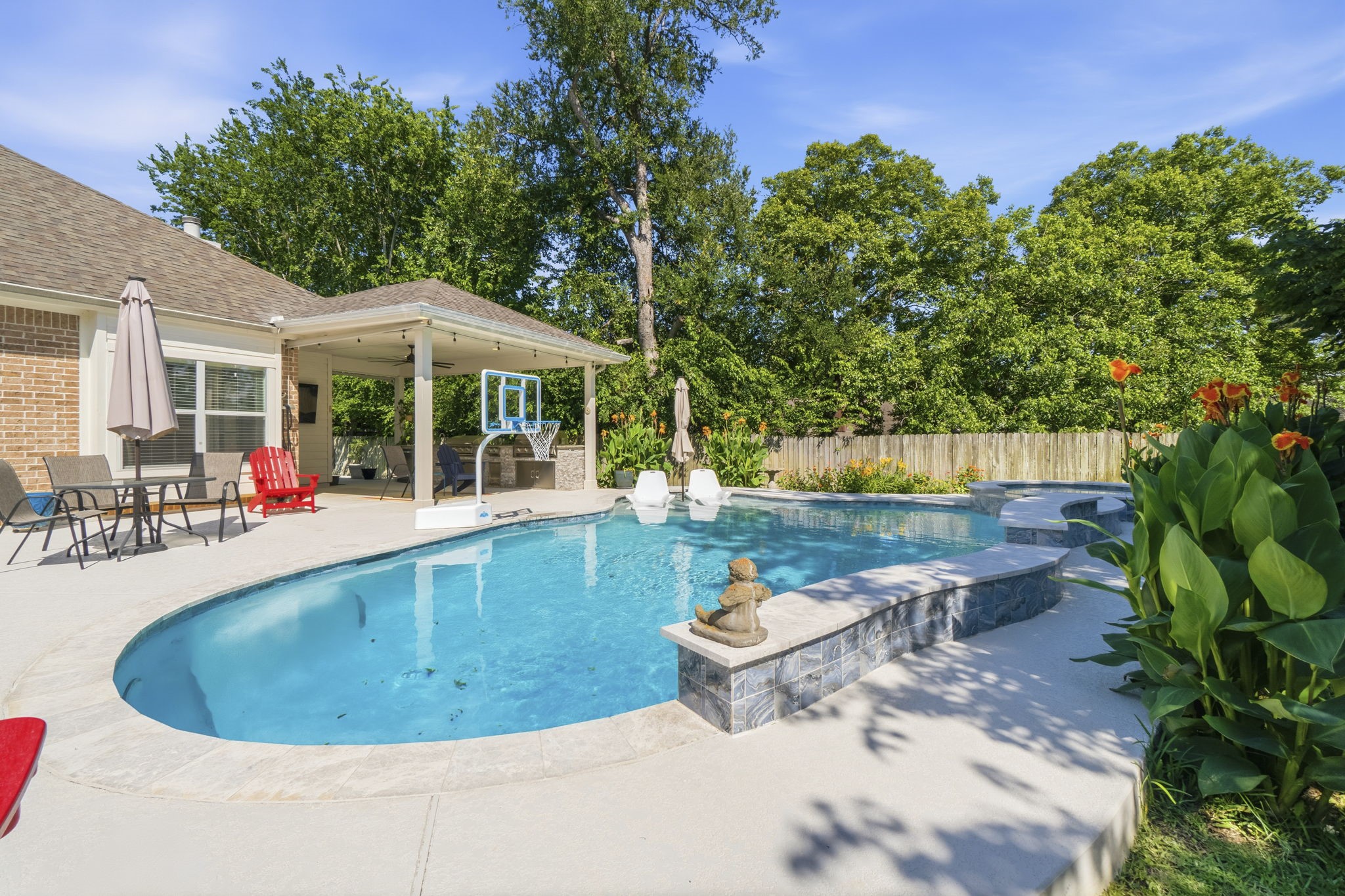 10802 Windswept Montgomery, TX 77356 - Photo 5 of 42 a view of a swimming pool with lounge chair