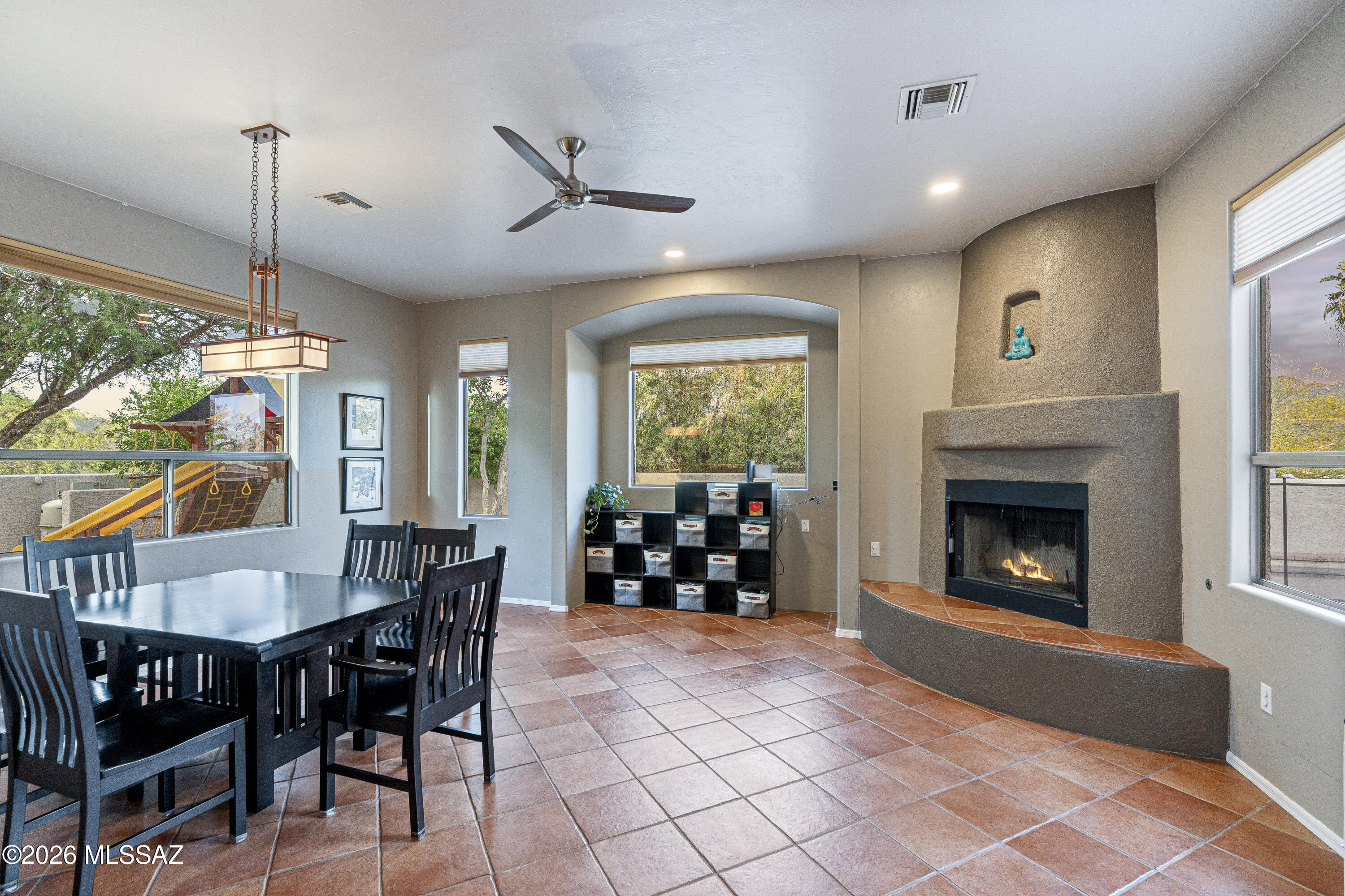 11770 North Copper Ridge Place Tucson, AZ 85737 - Photo 19 of 45 Beehive fireplace in your family room