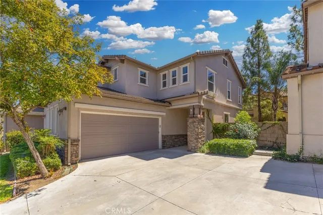 a house with trees in front of it