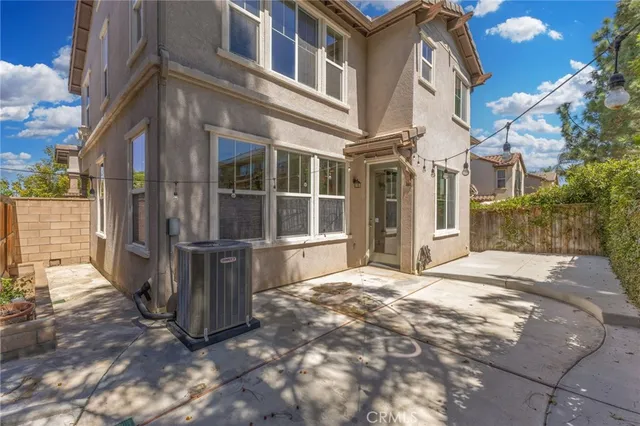 a view of a building with a yard