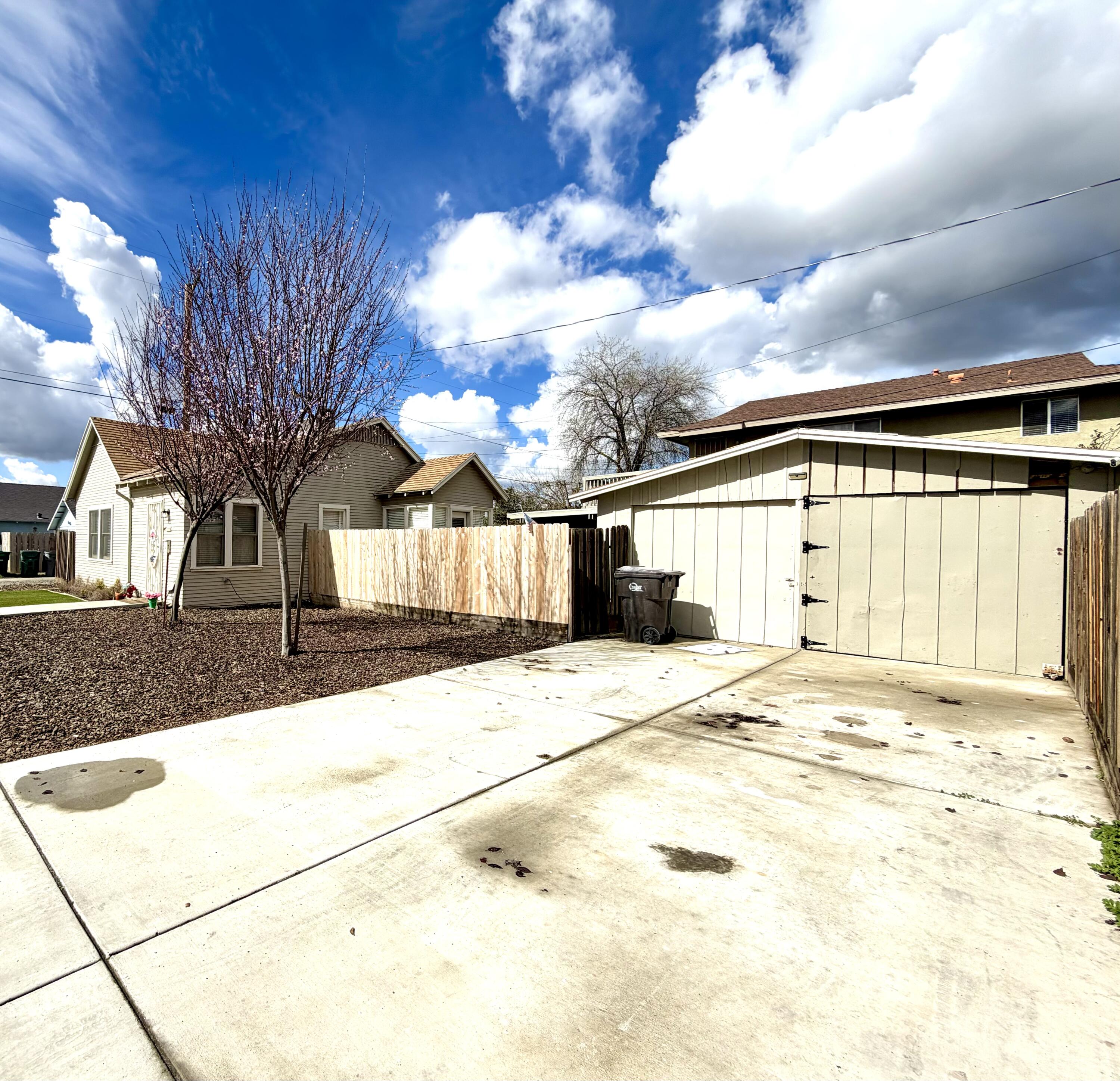 200 North B Street Exeter, CA 93221 - Photo 10 of 20 a view of a house with snow on the road