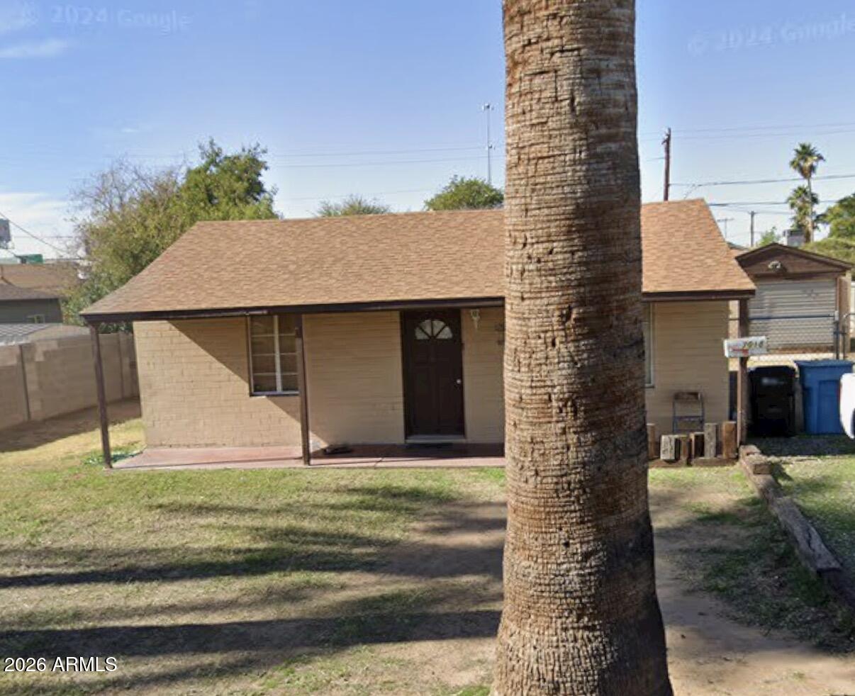 7018 North 23rd Lane Phoenix, AZ 85021 - Photo 1 of 1 a front view of a house with garden
