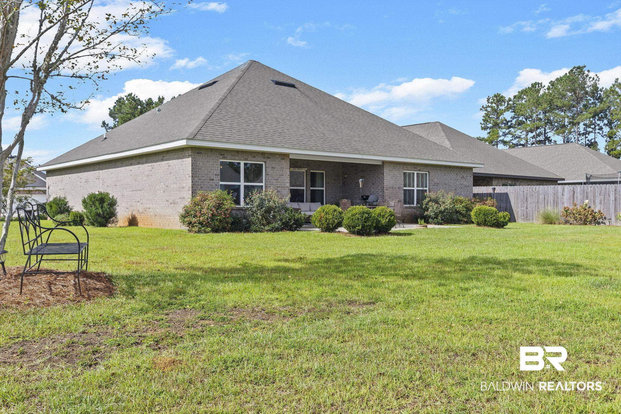31663 Kestrel Loop Daphne, AL 36527 - Photo 55 of 86 Rear view of house with a yard