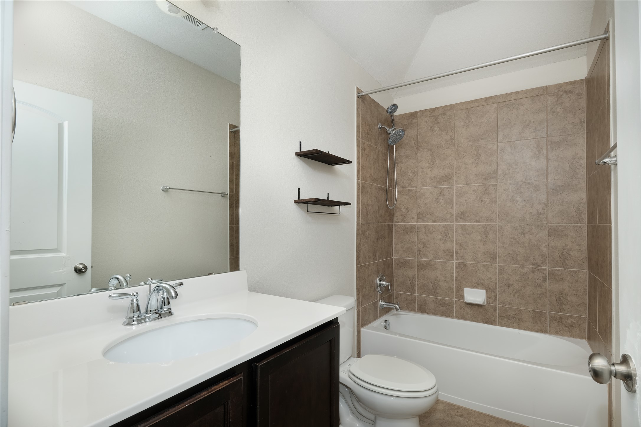 1804 Elaina Loop Leander, TX 78641 - Photo 11 of 12 Bathroom with vanity and shower / bathtub combination