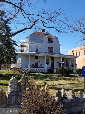 a view of a building with a swimming pool